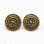 Pendientes con clip dorados y piedra azul